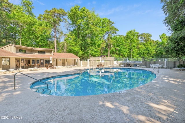 view of pool featuring a patio