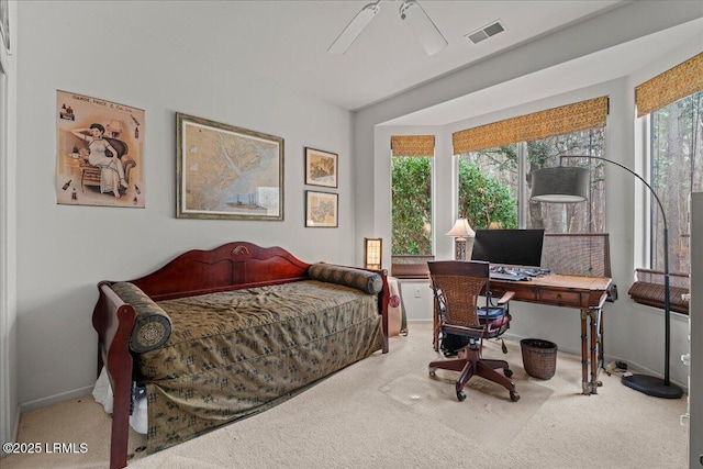 bedroom featuring a ceiling fan, carpet flooring, visible vents, and baseboards