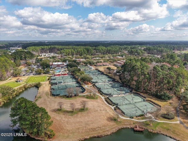 birds eye view of property with a water view