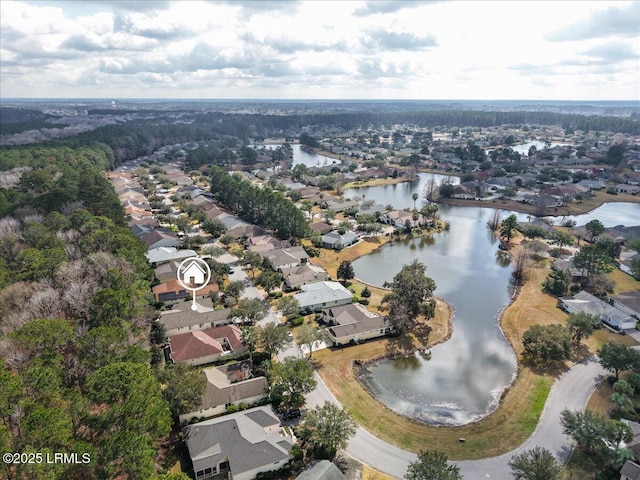 birds eye view of property with a residential view and a water view