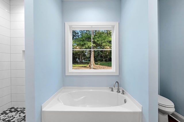 95 Salkehatchie Rd, Yemassee, SC 29945 - bathroom with a garden tub, toilet, and a tile shower