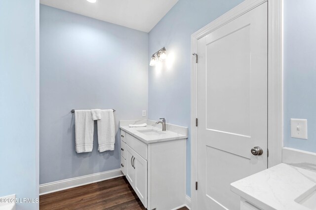 95 Salkehatchie Rd, Yemassee, SC 29945 - bathroom with vanity, baseboards, and wood finished floors