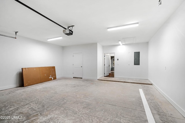 95 Salkehatchie Rd, Yemassee, SC 29945 - garage with electric panel, a garage door opener, and baseboards