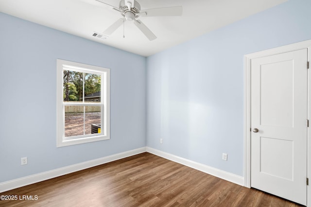 95 Salkehatchie Rd, Yemassee, SC 29945 - empty room with wood finished floors, baseboards, and ceiling fan