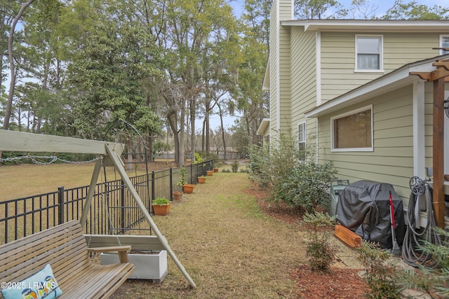 view of yard featuring fence