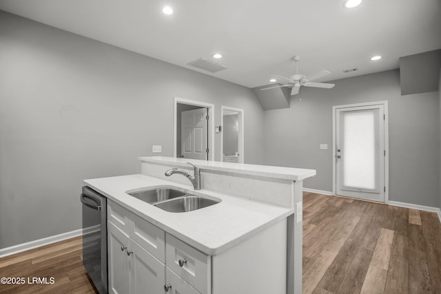 kitchen with a sink, dishwasher, ceiling fan, visible vents, and recessed lighting
