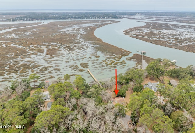 drone / aerial view with a water view