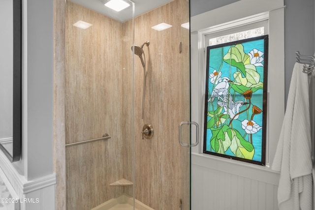 bathroom featuring a shower stall