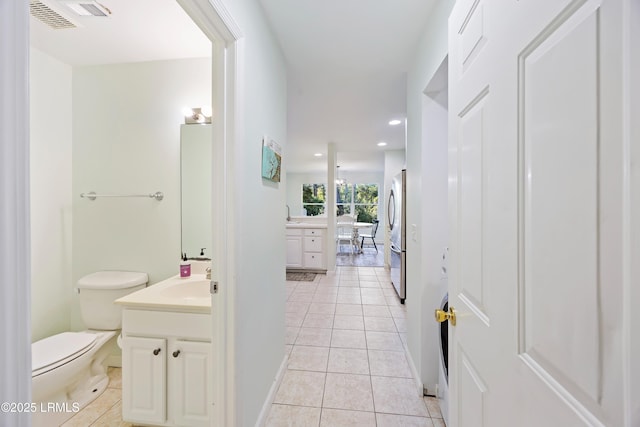 52 Lake Linden Ln Unit 52, Bluffton, SC 29910 - bathroom with vanity, tile patterned flooring, and recessed lighting