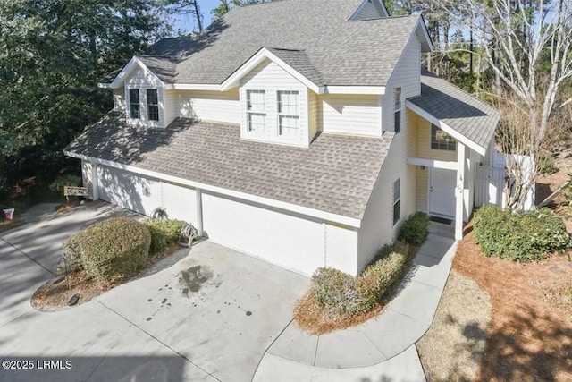 52 Lake Linden Ln Unit 52, Bluffton, SC 29910 - view of side of property with roof with shingles and concrete driveway