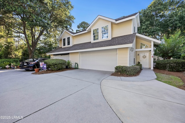 52 Lake Linden Ln Unit 52, Bluffton, SC 29910 - view of front of property with driveway, a garage, and roof with shingles