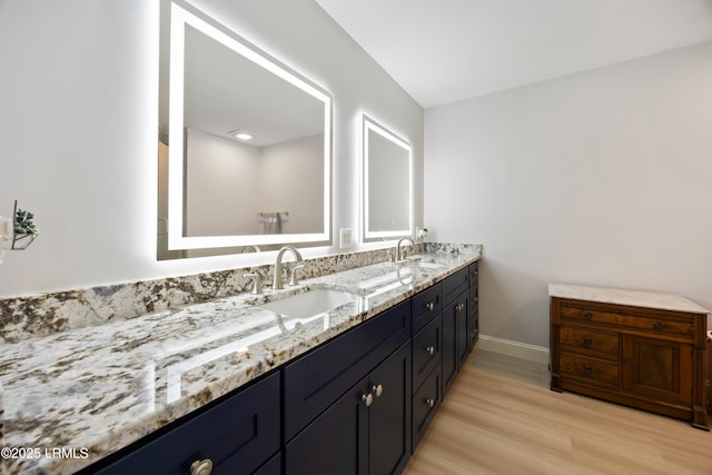52 Lake Linden Ln Unit 52, Bluffton, SC 29910 - bathroom with double vanity and wood finished floors