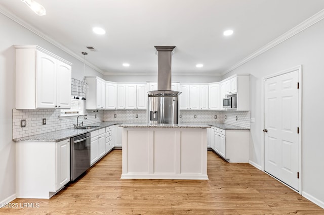 5 Susan Ct, Beaufort, SC 29907 - kitchen with appliances with stainless steel finishes, a sink, crown molding, decorative backsplash, and light stone countertops