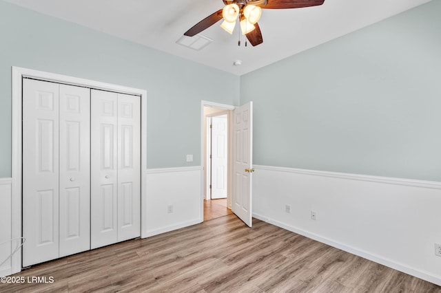 5 Susan Ct, Beaufort, SC 29907 - unfurnished bedroom with wood finished floors, a closet, a ceiling fan, and baseboards