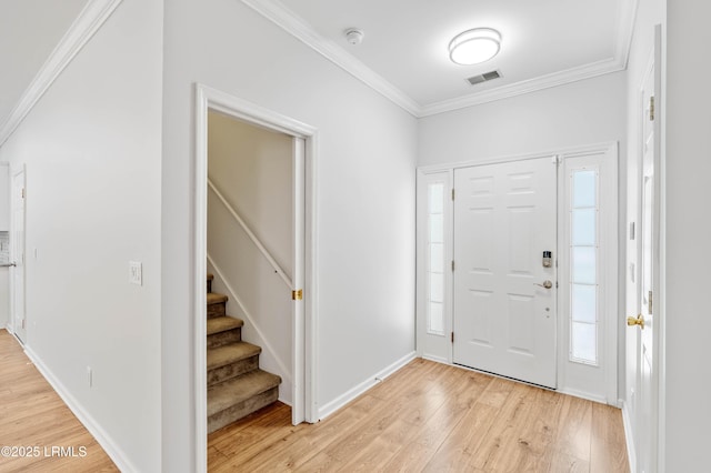 5 Susan Ct, Beaufort, SC 29907 - foyer featuring light wood-style floors, crown molding, stairway, baseboards, and plenty of natural light