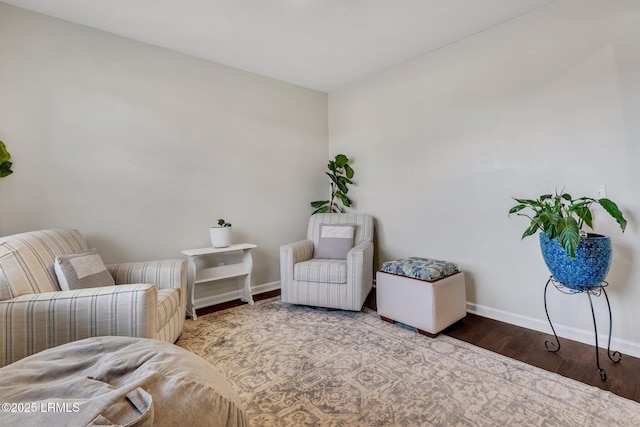 living area with wood-type flooring