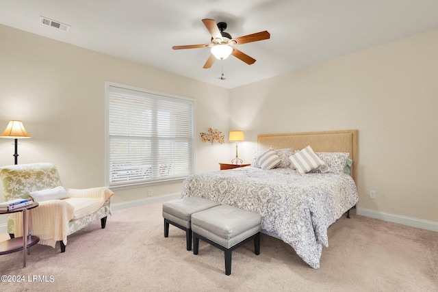 bedroom featuring ceiling fan and carpet flooring