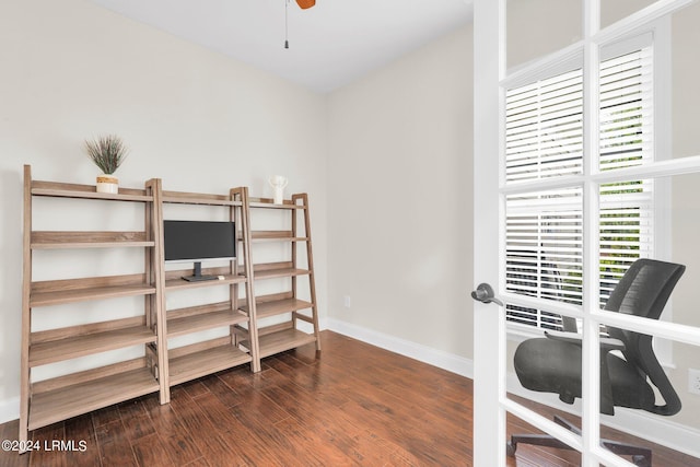 office area featuring dark wood-type flooring and ceiling fan