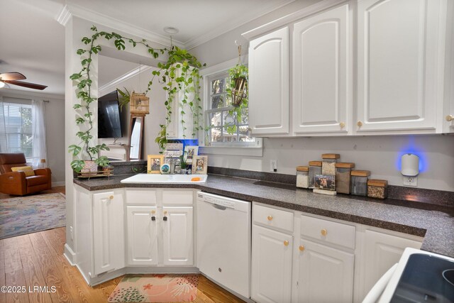 kitchen with white cabinetry, ceiling fan, white dishwasher, light hardwood / wood-style floors, and crown molding