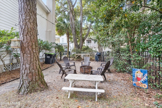 view of patio / terrace with a fire pit