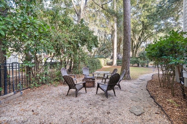 view of patio with a fire pit