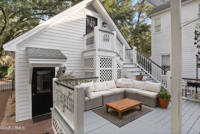 wooden deck with an outdoor hangout area