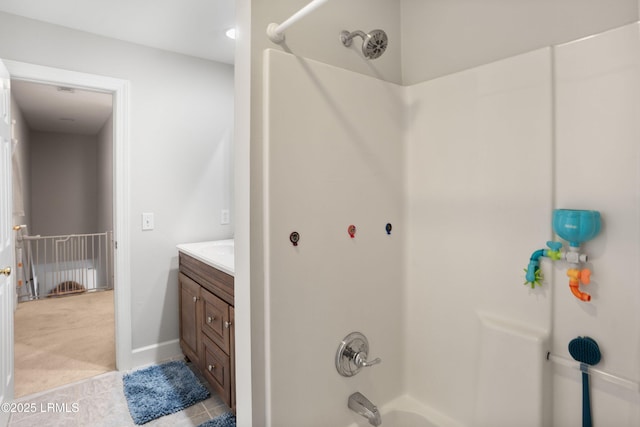 bathroom featuring vanity and tub / shower combination