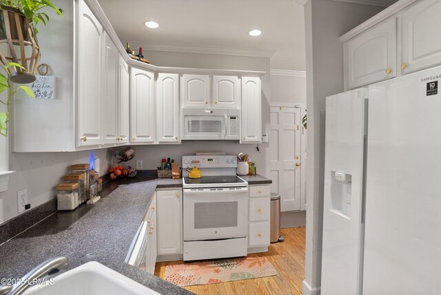 kitchen featuring sink, white cabinetry, crown molding, light hardwood / wood-style flooring, and white appliances