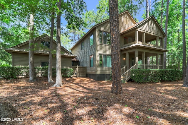 1 Royal James Dr, Hilton Head Island, SC 29926 - rear view of property featuring a balcony and a porch