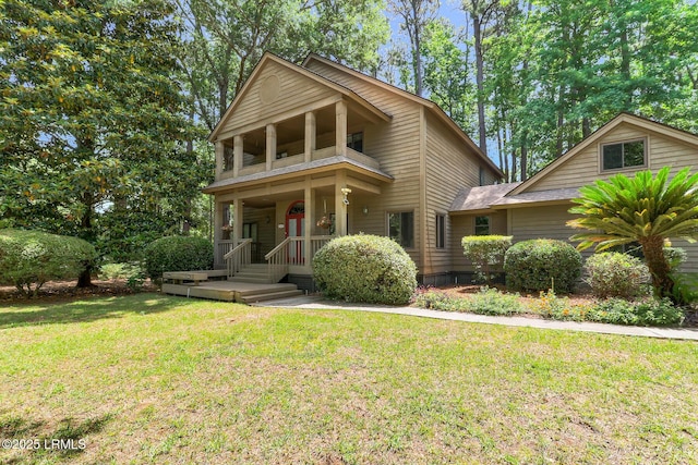 1 Royal James Dr, Hilton Head Island, SC 29926 - view of front facade with a front yard and a balcony