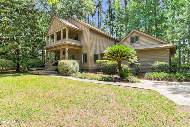 1 Royal James Dr, Hilton Head Island, SC 29926 - view of front facade with a front lawn and a balcony