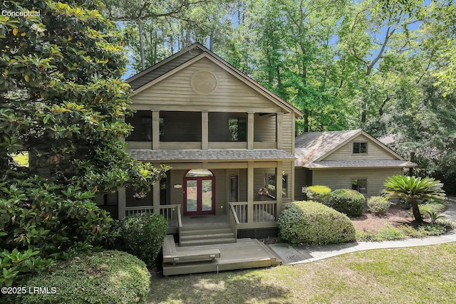 1 Royal James Dr, Hilton Head Island, SC 29926 - view of front facade featuring a porch, french doors, and a shingled roof