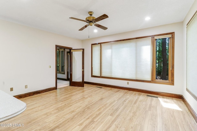 1 Royal James Dr, Hilton Head Island, SC 29926 - unfurnished room with light wood finished floors, a ceiling fan, baseboards, and recessed lighting
