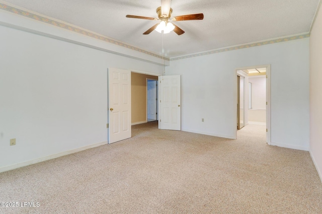 1 Royal James Dr, Hilton Head Island, SC 29926 - carpeted spare room featuring ceiling fan, baseboards, and a textured ceiling