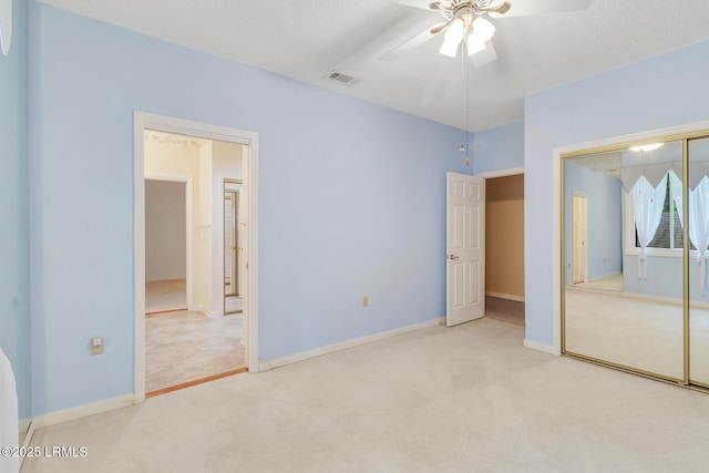1 Royal James Dr, Hilton Head Island, SC 29926 - unfurnished bedroom featuring carpet, a closet, baseboards, and ceiling fan