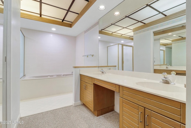 1 Royal James Dr, Hilton Head Island, SC 29926 - bathroom with a garden tub, double vanity, a stall shower, recessed lighting, and baseboards
