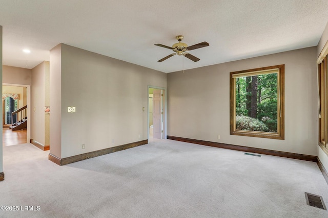 1 Royal James Dr, Hilton Head Island, SC 29926 - carpeted spare room featuring ceiling fan and baseboards