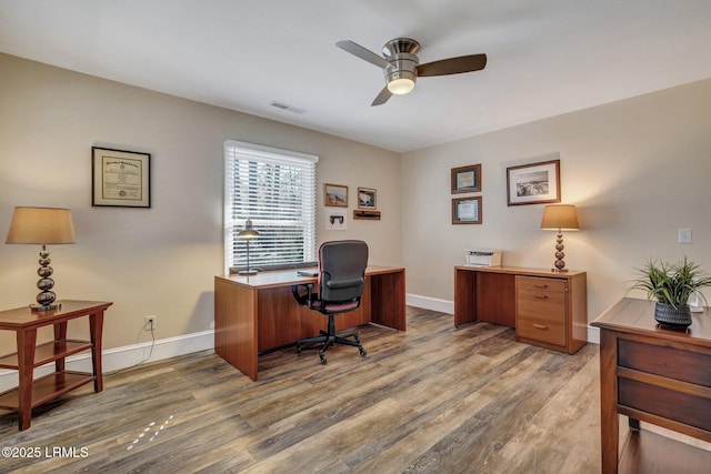 office space with hardwood / wood-style flooring and ceiling fan