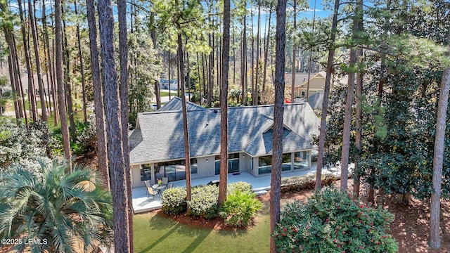 rear view of property with a patio