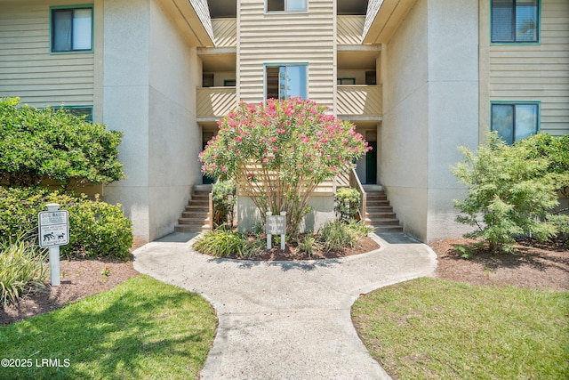 167 Beach Club Villa Dr Unit 167, Fripp Island, SC 29920 - doorway to property featuring stucco siding