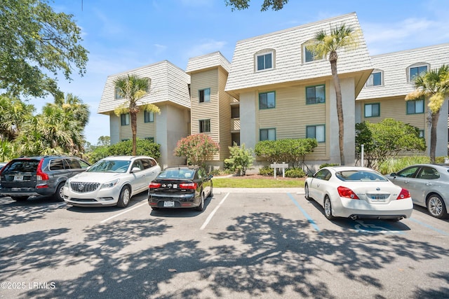 167 Beach Club Villa Dr Unit 167, Fripp Island, SC 29920 - view of front of house with mansard roof and uncovered parking