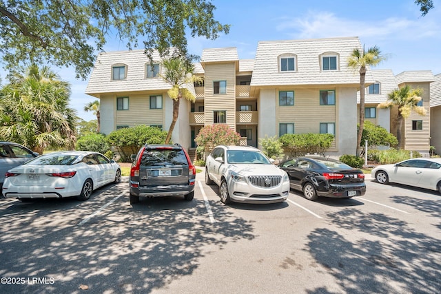 167 Beach Club Villa Dr Unit 167, Fripp Island, SC 29920 - view of front of property with mansard roof and uncovered parking