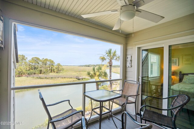 167 Beach Club Villa Dr Unit 167, Fripp Island, SC 29920 - balcony featuring ceiling fan and a view of rural / pastoral area