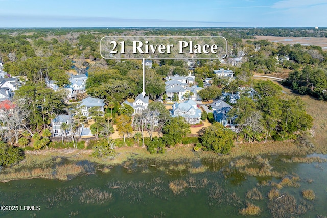 aerial view featuring a residential view and a water view