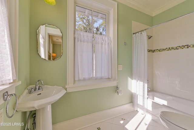 full bath with tile patterned floors, toilet, shower / bath combo with shower curtain, and ornamental molding