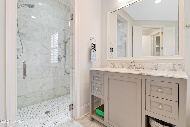 bathroom featuring vanity and walk in shower