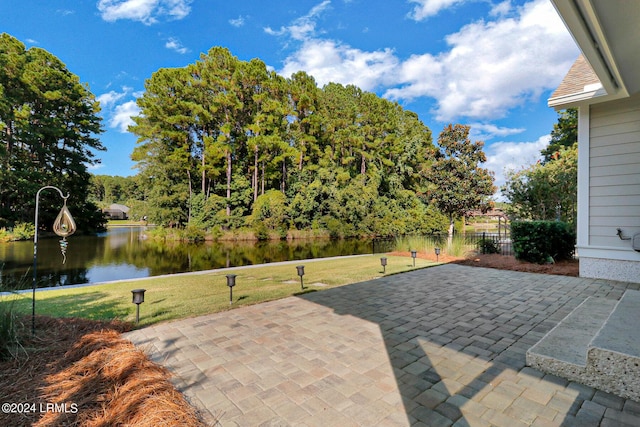 view of patio featuring a water view