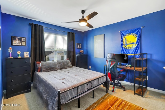 bedroom with carpet floors, baseboards, and a ceiling fan