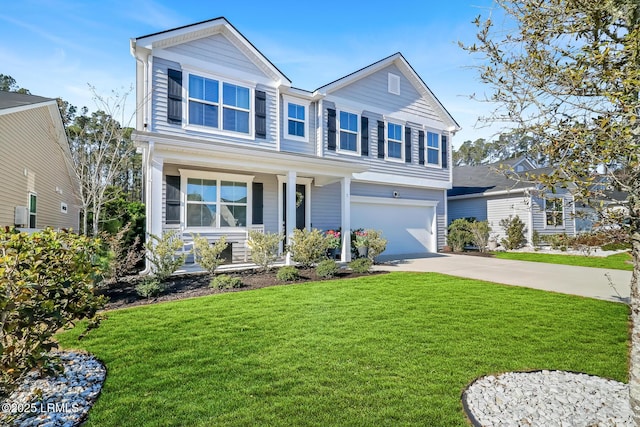 view of front of property featuring a garage, a front yard, driveway, and a porch