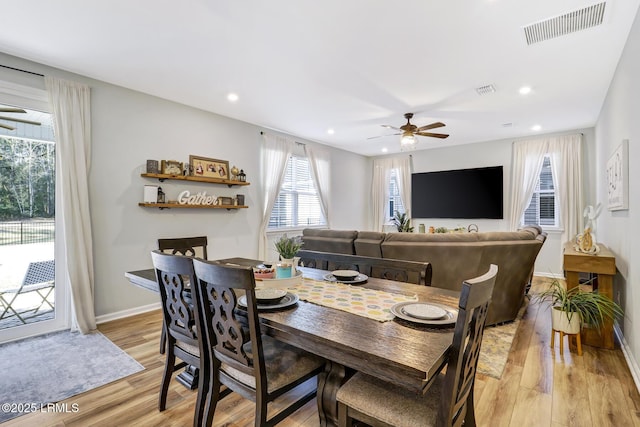 dining area with baseboards, visible vents, a ceiling fan, light wood-style floors, and recessed lighting